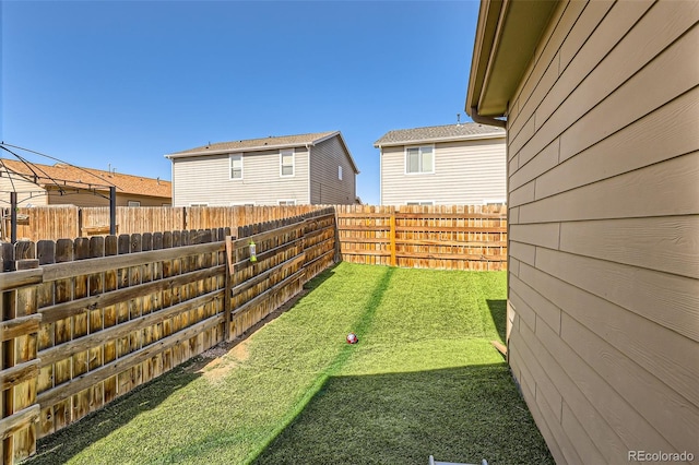 view of yard with fence