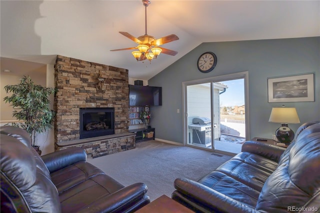 carpeted living room featuring a fireplace, ceiling fan, and vaulted ceiling