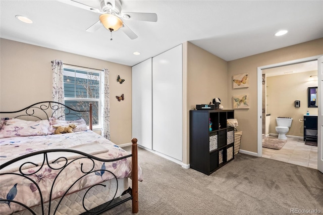 1128 S Duquesne Cir, Aurora, CO 80018 - carpeted bedroom featuring a closet, recessed lighting, ensuite bath, baseboards, and a ceiling fan