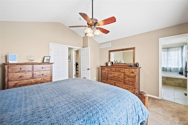 1128 S Duquesne Cir, Aurora, CO 80018 - carpeted bedroom featuring vaulted ceiling, baseboards, ceiling fan, and connected bathroom