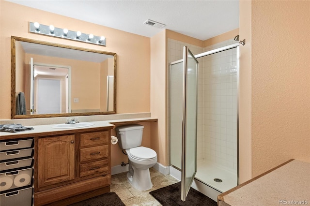 1128 S Duquesne Cir, Aurora, CO 80018 - full bath with toilet, a stall shower, vanity, and tile patterned floors