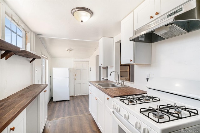 kitchen featuring wood counters, white appliances, dark wood-type flooring, white cabinets, and sink