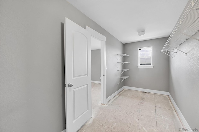 spacious closet with visible vents