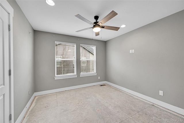 unfurnished room featuring a ceiling fan, recessed lighting, visible vents, and baseboards