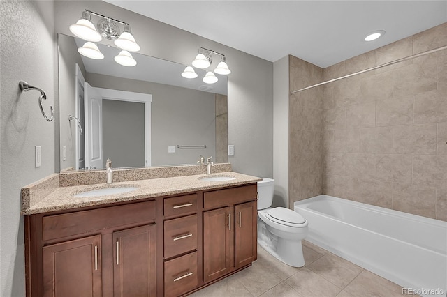 full bathroom featuring tile patterned flooring, a sink, toilet, and double vanity