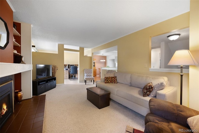 5082 Masheena Ln Unit 4, Colorado Springs, CO 80917 - living area with a tile fireplace and dark carpet