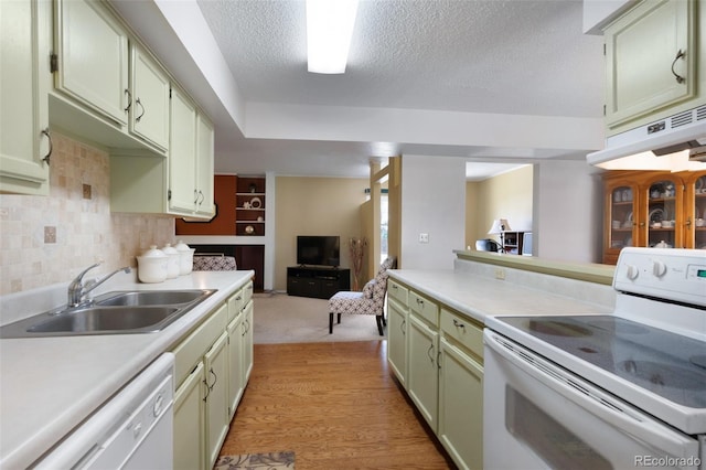 5082 Masheena Ln Unit 4, Colorado Springs, CO 80917 - kitchen with white appliances, a sink, light countertops, a textured ceiling, and decorative backsplash