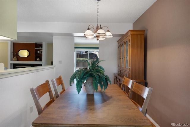 5082 Masheena Ln Unit 4, Colorado Springs, CO 80917 - dining area with a chandelier