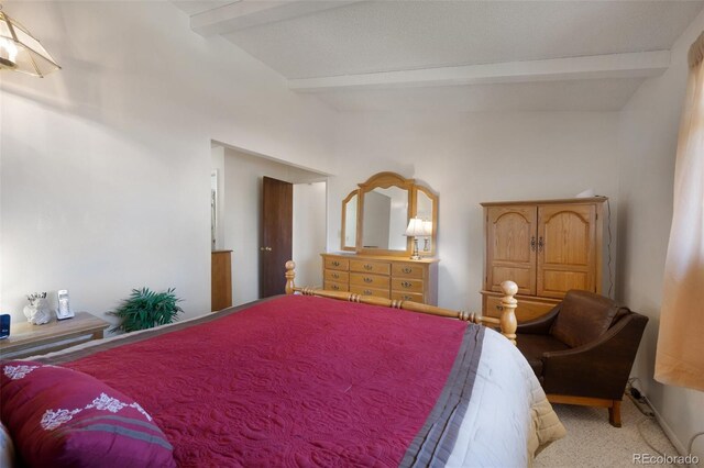 5082 Masheena Ln Unit 4, Colorado Springs, CO 80917 - bedroom with beamed ceiling and light colored carpet