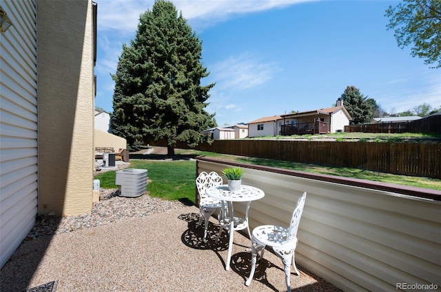 5082 Masheena Ln Unit 4, Colorado Springs, CO 80917 - view of patio / terrace with central air condition unit and a residential view