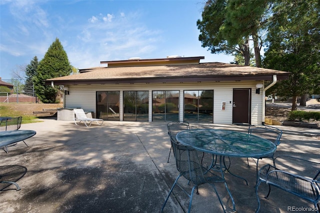 5082 Masheena Ln Unit 4, Colorado Springs, CO 80917 - rear view of house with a patio