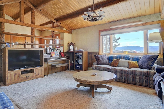 28453 County Road 337, Buena Vista, CO 81211 - living room with carpet floors, a chandelier, lofted ceiling with beams, and wooden ceiling