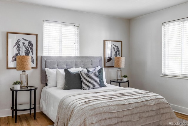 bedroom featuring wood-type flooring