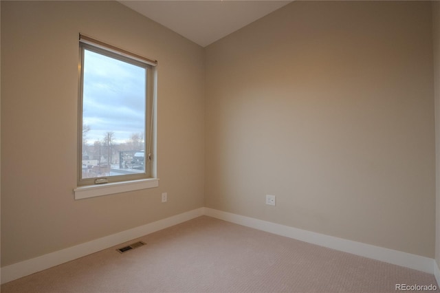 unfurnished room featuring carpet floors