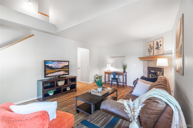 135 Carina Cir Unit 104, Loveland, CO 80537 - living area with wood finished floors and a fireplace