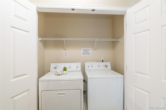 135 Carina Cir Unit 104, Loveland, CO 80537 - washroom with washer and clothes dryer