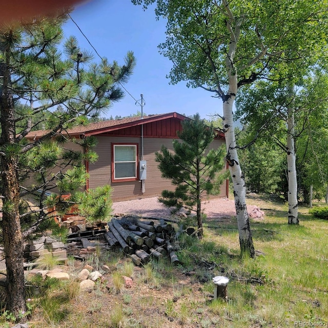 view of side of home with board and batten siding