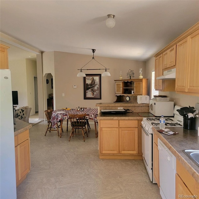 kitchen with light brown cabinetry, decorative light fixtures, light tile patterned floors, and white appliances