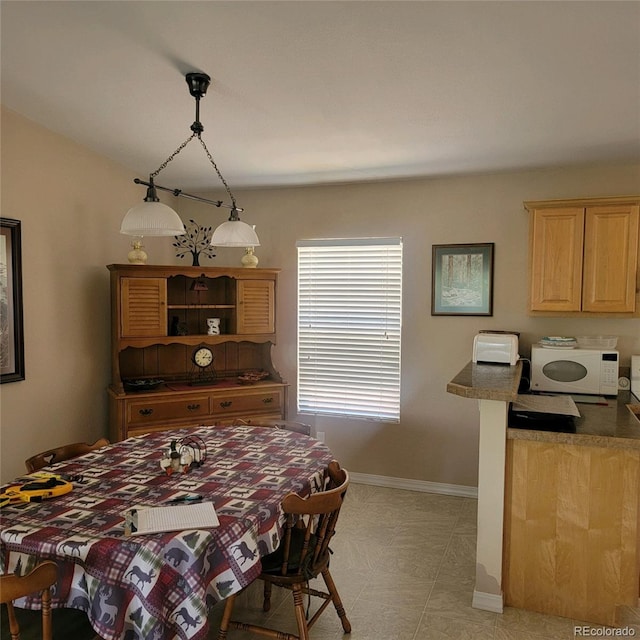 view of tiled dining room