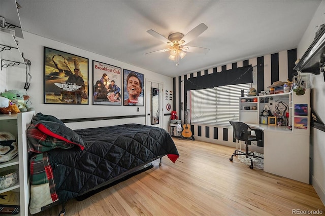 bedroom featuring ceiling fan and wood finished floors