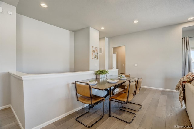 dining area featuring light hardwood / wood-style flooring