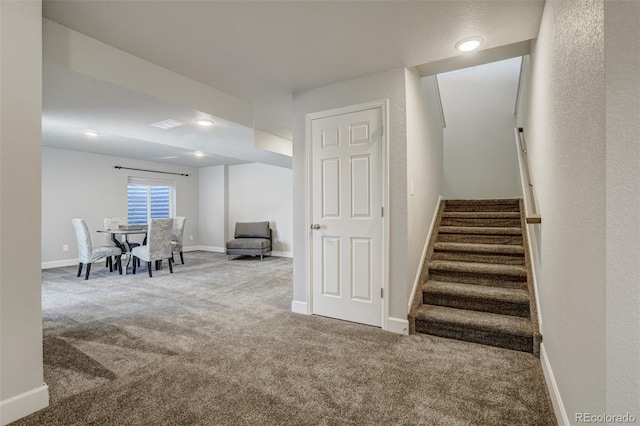 stairs with carpet floors