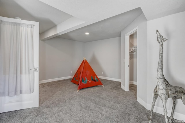 recreation room with carpet