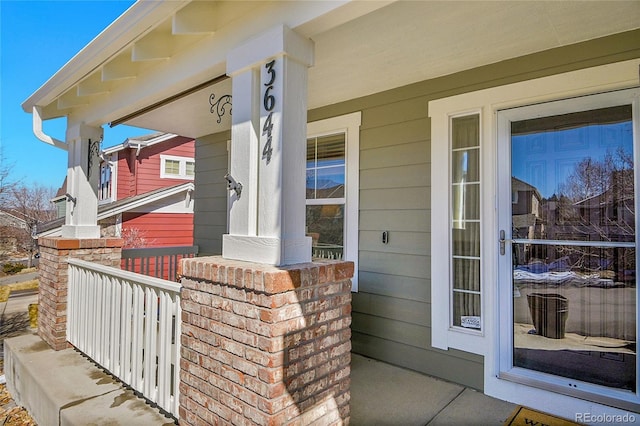 entrance to property with a porch