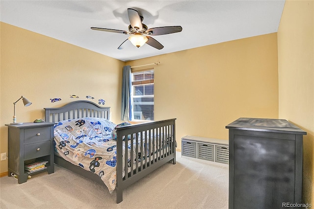 bedroom with baseboards, carpet floors, and ceiling fan