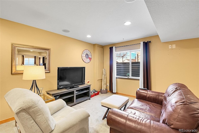 living room with carpet flooring, recessed lighting, and baseboards