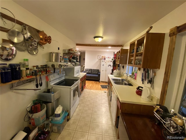 8741 Faraday St, Denver, CO 80229 - kitchen with white appliances, glass insert cabinets, and light floors