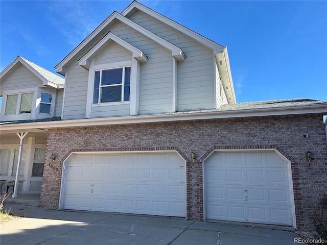 view of front of home with a garage