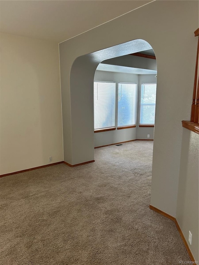 spare room with carpet flooring