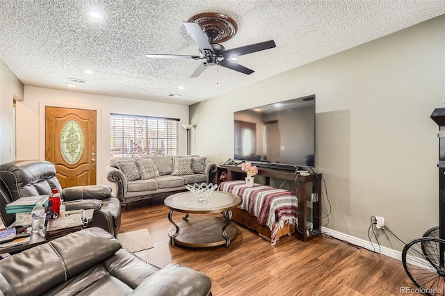 15685 E 50th Ave, Denver, CO 80239 - living area with recessed lighting, ceiling fan, a textured ceiling, and wood finished floors