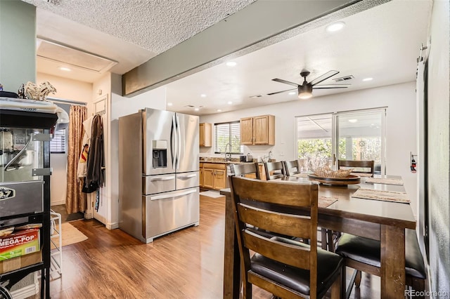 15685 E 50th Ave, Denver, CO 80239 - dining space featuring a ceiling fan, light wood-style flooring, recessed lighting, and a textured ceiling