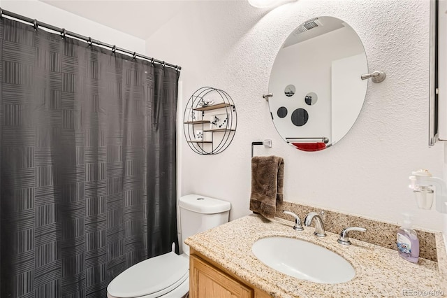 15685 E 50th Ave, Denver, CO 80239 - bathroom with vanity, toilet, and a shower with curtain