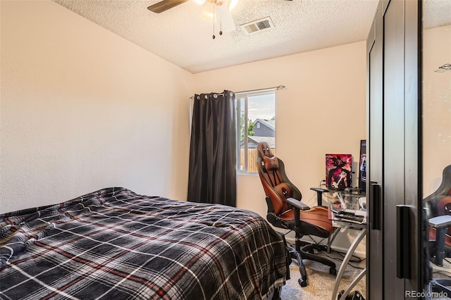 15685 E 50th Ave, Denver, CO 80239 - carpeted bedroom featuring a ceiling fan, visible vents, and a textured ceiling