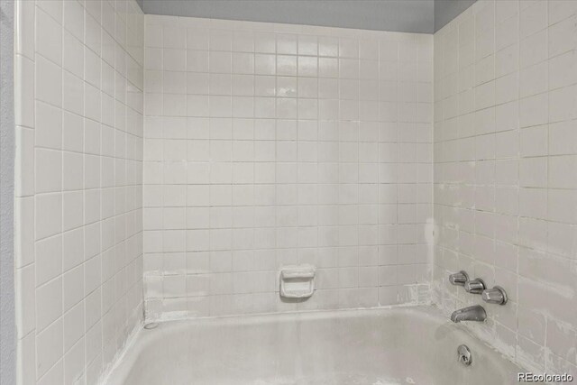 full bath featuring shower / tub combination