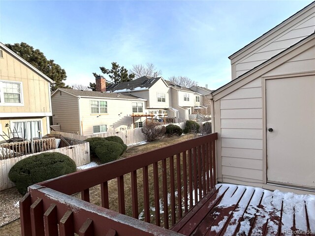 wooden deck featuring a residential view