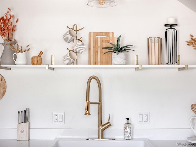 interior details featuring a sink