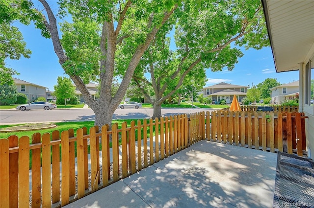6885 E Arizona Ave Unit D, Denver, CO 80224 - view of patio / terrace featuring a residential view