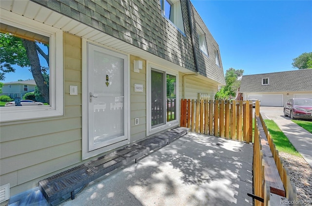 6885 E Arizona Ave Unit D, Denver, CO 80224 - doorway to property featuring mansard roof