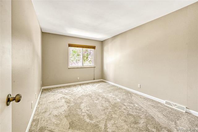 unfurnished room with carpet