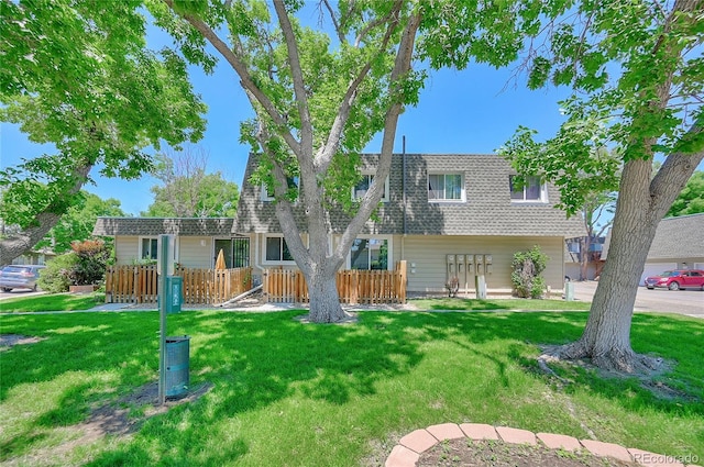 6885 E Arizona Ave Unit D, Denver, CO 80224 - view of front of property with mansard roof and roof with shingles