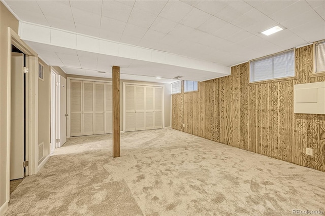 basement with carpet flooring