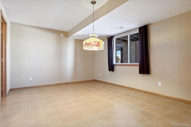 empty room with light tile patterned floors