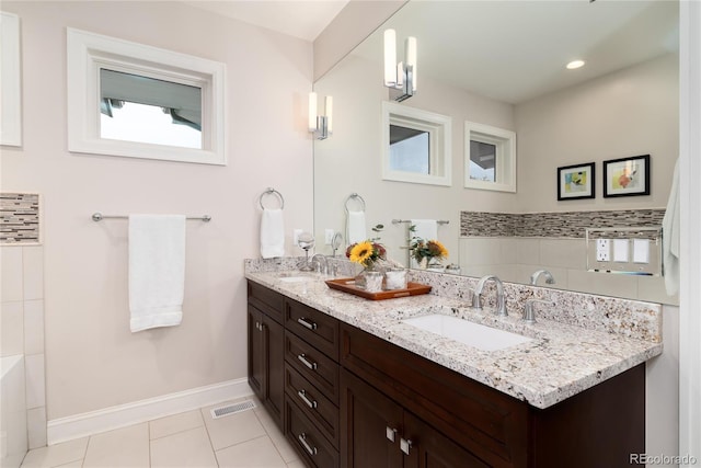 bathroom with vanity and tile patterned flooring