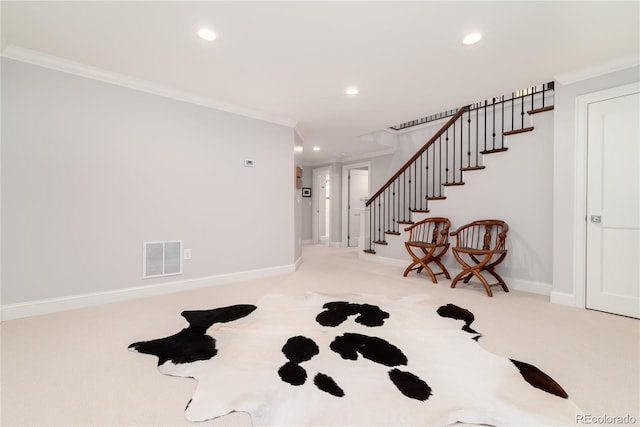 interior space featuring crown molding and light colored carpet