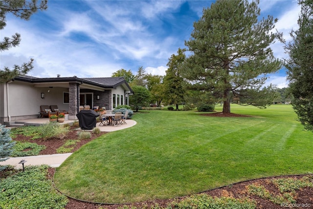 view of yard with a patio