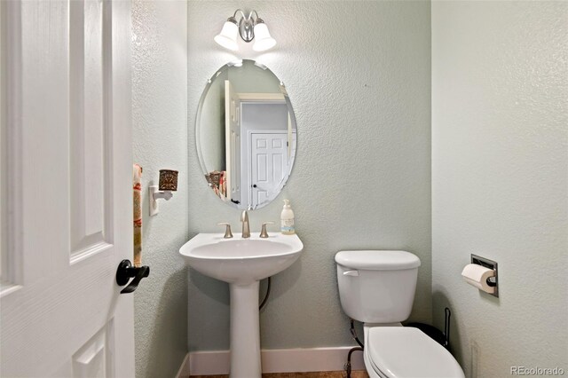 879 Quintana Ln, Erie, CO 80516 - bathroom featuring toilet